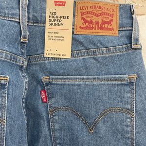 720 high rise super skinny light wash jeans.